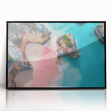 Large abstract wall art depicting Caribbean scenery in muted blues and greens, framed in black acrylic.