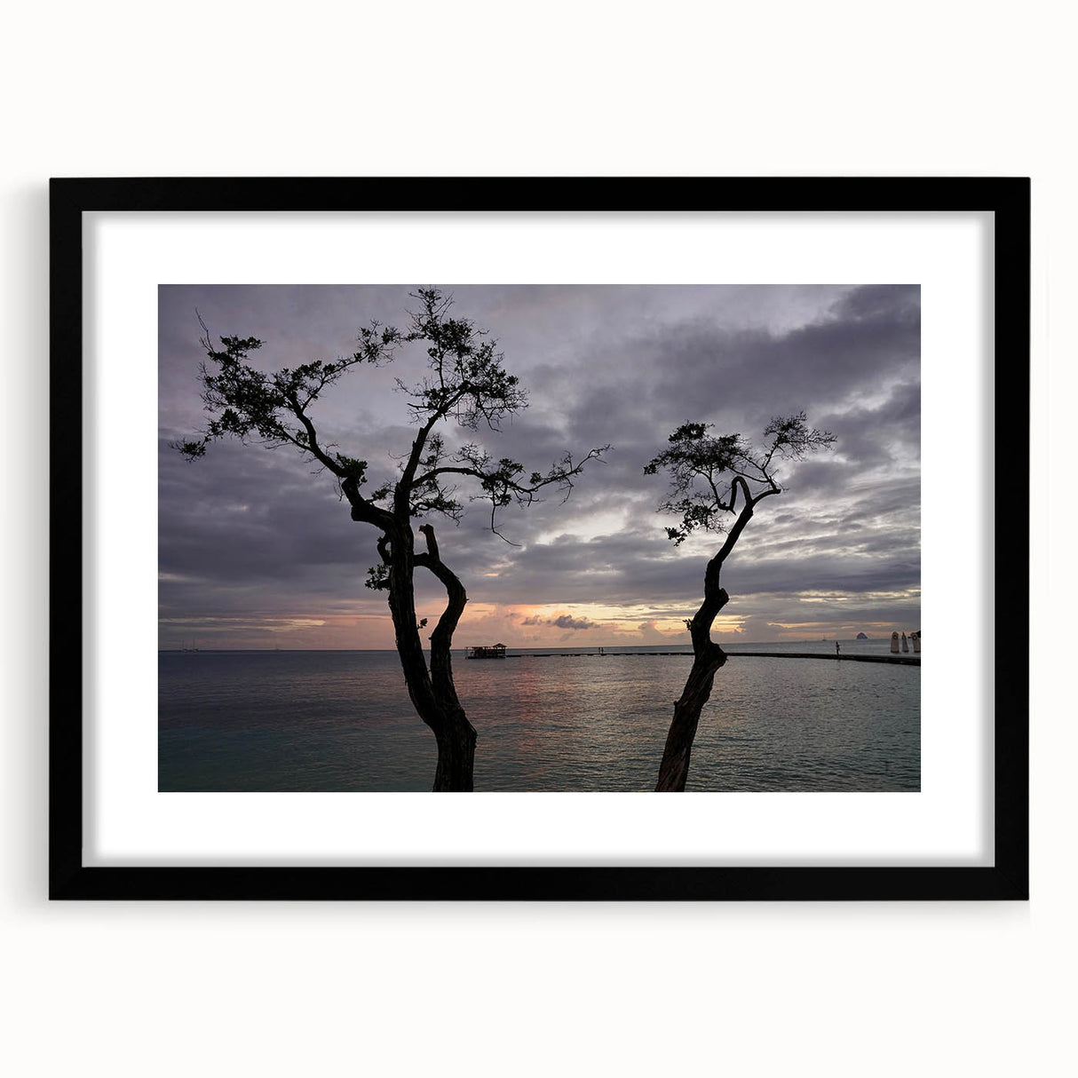 Abstract art print of a Caribbean scenery in vibrant colors on a textured, extra large canvas, framed in black.