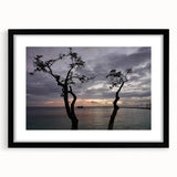 Abstract art print of a Caribbean scenery in vibrant colors on a textured, extra large canvas, framed in black.