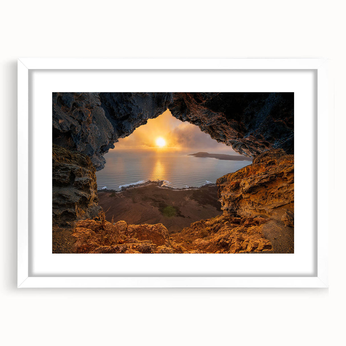 Textured abstract art print depicting a serene Caribbean scenery in muted blue and green tones, framed with a white mat.