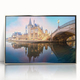 Large art print of a European Belgium landscape in muted colors, framed in silver acrylic.