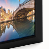Extra large framed canvas featuring a textured, colorful European scenery in black with vibrant accents.