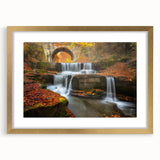 Abstract art print depicting a European landscape in muted earth tones on a framed gold mat, suitable for dining room decor.