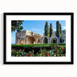 Extra large abstract art print of a vibrant, colorful European landscape on a textured canvas, framed in black.