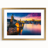 Abstract art print of Prague scenery in muted earth tones on a framed canvas, suitable for dining room decor.