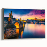 Framed canvas of a vintage-style Prague landscape painting, featuring colorful art on a black background.