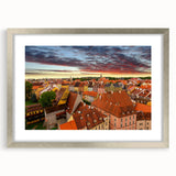 Extra large abstract art print of a textured European scenery in pastel colors, framed in silver.