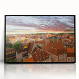 Large abstract wall art of a Czech Republic scenery in muted gray and blue tones, framed in black acrylic.