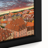 Extra large framed canvas depicting a textured, colorful European cityscape in black with vibrant accents.