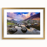 Abstract art print of Cumbria's landscape in muted earth tones, framed in gold, suitable for dining room decor.