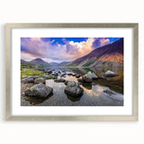Extra large abstract art print of Cumbria's landscape in muted green and blue hues, framed with a silver mat.