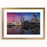 Abstract art print of the Thames River in muted blue and gray tones, framed in gold, suitable for dining room decor.