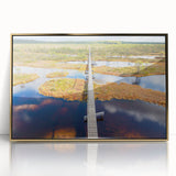 Art deco style poster of a European cityscape in gold and black tones, framed acrylic.