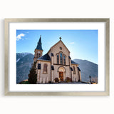 Extra large abstract art print of the French Alps in textured shades of blue and white, framed with a silver mat.