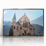 Large art print of French Alps with snow-capped mountains in muted blue and white, framed acrylic.