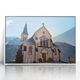 Mid-century modernist art depicting the French Alps in muted green and blue tones on a framed acrylic panel.