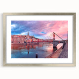 Extra large abstract art print of Lyon scenery in textured style with muted earth tones, framed in silver.