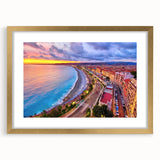 Abstract art print of Nice, France in muted gold and blue tones, framed with a gold mat, suitable for dining room decor.