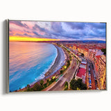 Landscape art painting of Nice, France, featuring colorful buildings and sea, in a silver-framed canvas.