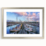 Extra large wall art depicting an abstract scene of Normandy in textured hues of blue and gray, framed with a silver mat.