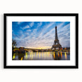Extra large colorful abstract art print of a Paris scenery in vibrant hues on textured canvas, framed in black.