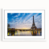 Textured art print of an abstract Paris scene in muted gray and blue tones, framed with a white mat.