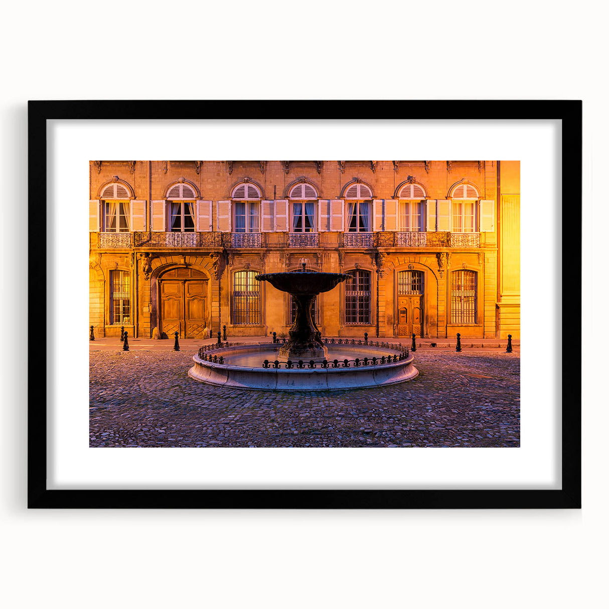 Colorful abstract art print of a Provencal landscape in vibrant hues on a large framed canvas, ideal for living room decor.