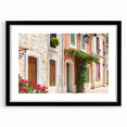 Extra large abstract art print featuring a colorful, textured depiction of a South France scenery, framed in black.