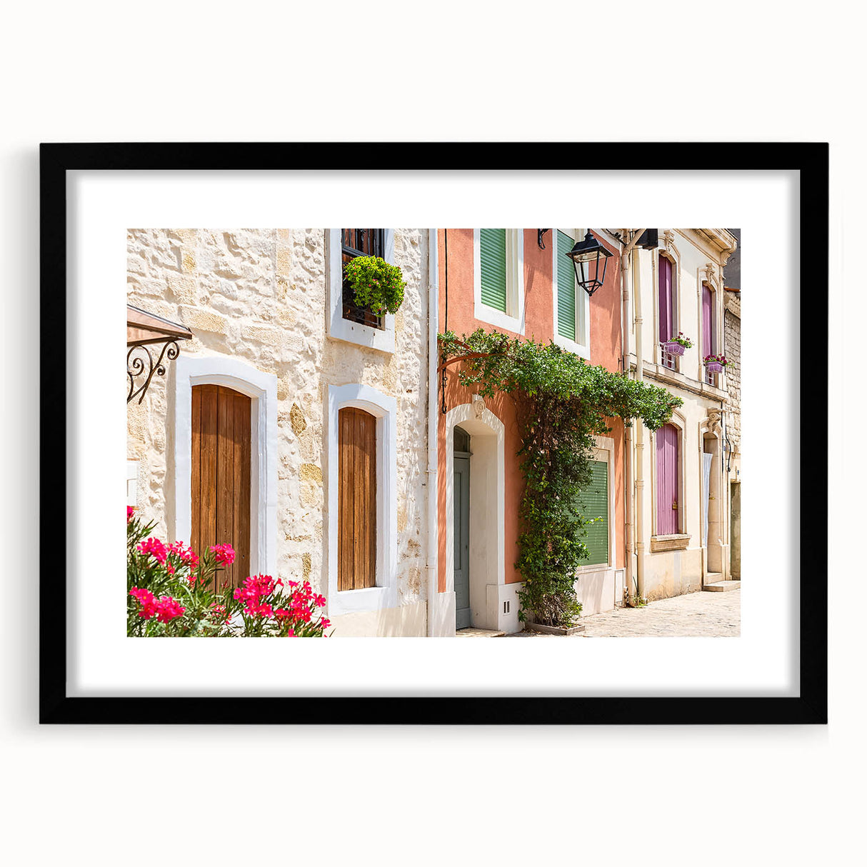 Extra large abstract art print featuring a colorful, textured depiction of a South France scenery, framed in black.