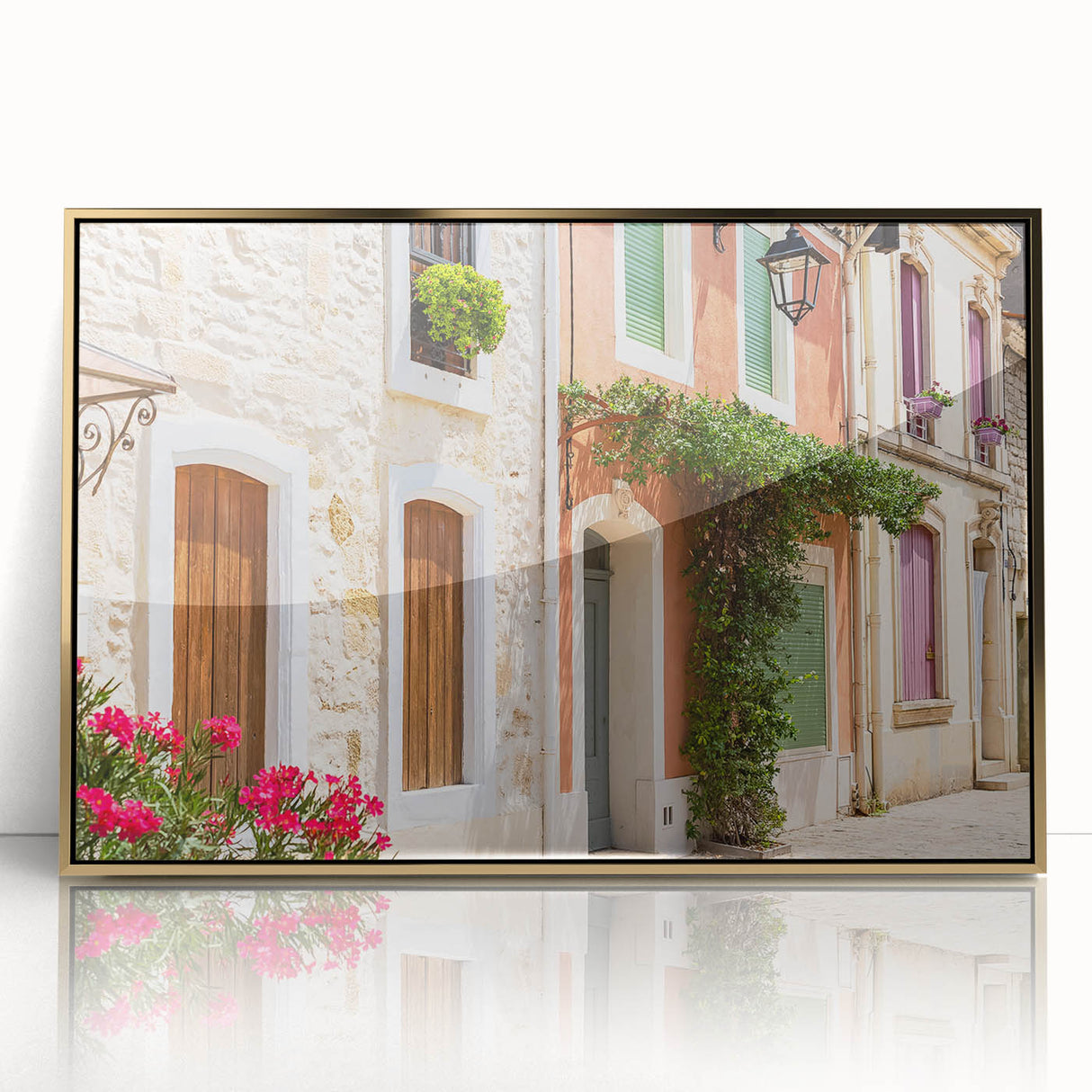 Art deco poster of a South France scenery in muted gold and blue tones, acrylic print framed, suitable for nursery wall art.