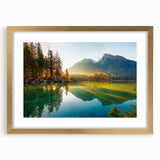 Abstract art print of a Bavarian landscape in muted earth tones, framed in gold, suitable for bedroom or dining room decor.