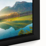 Extra large black wall art featuring a textured depiction of a Bavarian village with colorful accents.