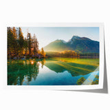 Rolled print of Bavarian landscape with lush greenery and distant mountains, in soft earth tones.