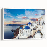 Vintage poster art of Santorini with vibrant blue and white hues on a framed canvas, ideal for living room decor.