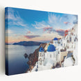 Side view of a stretched canvas depicting the Santorini skyline with vibrant blue and white tones.