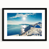 Colorful abstract art print of a European scenic view, with vibrant hues on a textured canvas, framed in black.