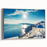 Framed canvas landscape art painting depicting a scenic view of Greece, with vibrant blue and white tones.