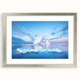 Extra large abstract art print featuring textured scenery of Greenland in muted green tones, framed in silver.