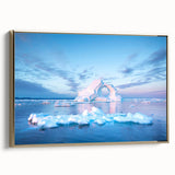 Framed canvas featuring a vintage-style landscape painting of Greenland, with muted green and black tones.