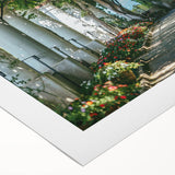 Art deco poster of Capri, Italy featuring serene blue and white tones on a rolled canvas.