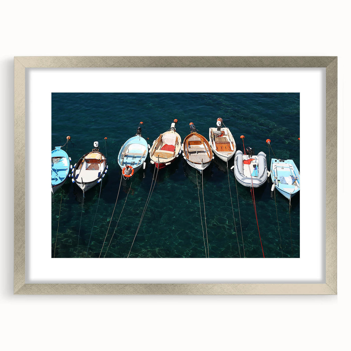Extra large wall art of Cinque Terre with textured abstract prints in vibrant colors, framed in silver.