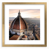 Abstract art print of Florence skyline in muted gold and blue tones on a framed canvas, suitable for dining room decor.