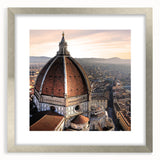 Extra large abstract art print of Florence scenery in muted earth tones on a silver-framed canvas.