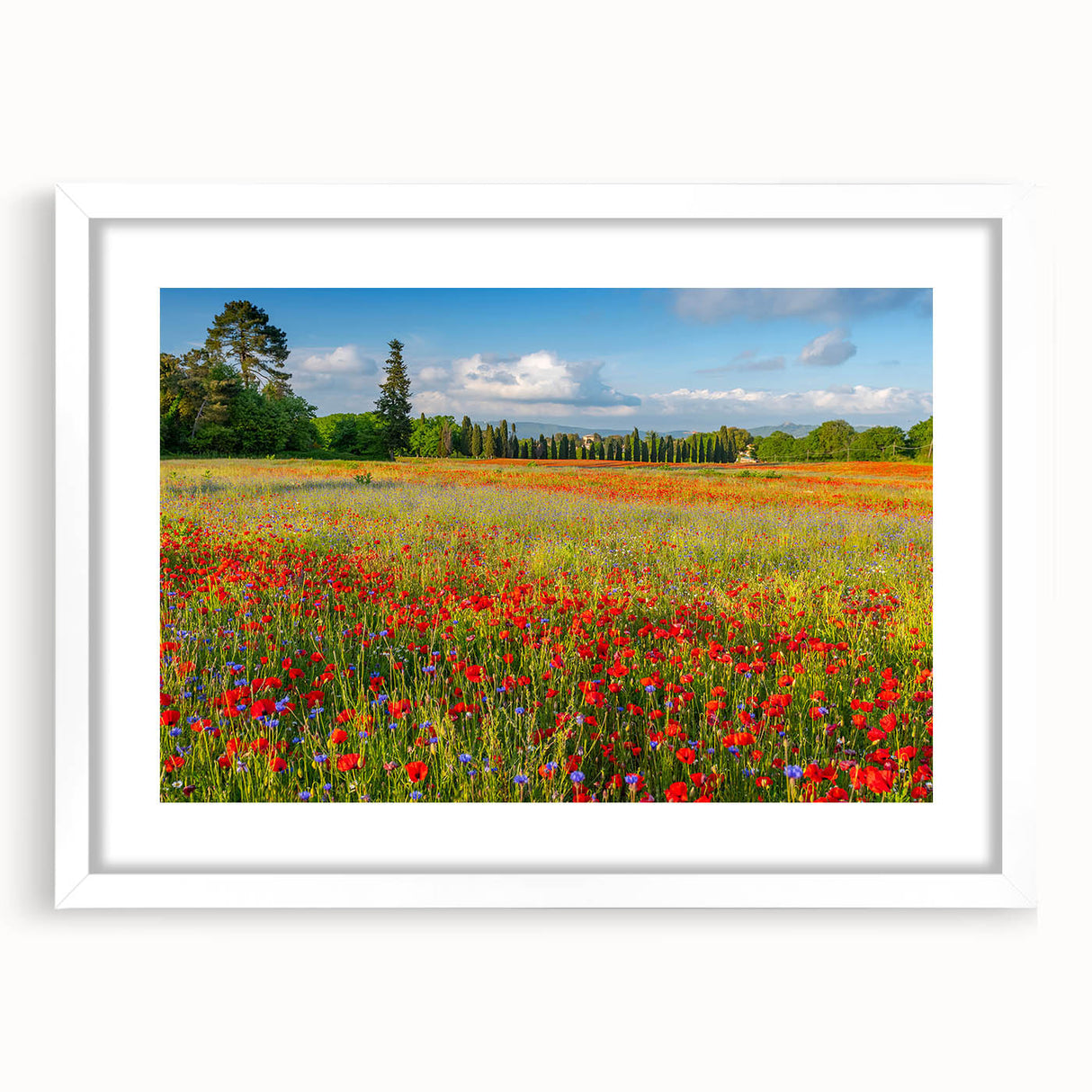 Textured art print of a Tuscan landscape in muted earth tones on a framed white mat, ideal for bedroom decor.