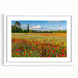 Textured art print of a Tuscan landscape in muted earth tones on a framed white mat, ideal for bedroom decor.
