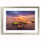 Abstract art print of a European scenery in muted earth tones on a framed canvas.