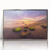 Large art print of a Lithuanian landscape in muted green and blue tones, framed in silver acrylic.