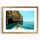 Abstract art print depicting the Malta coastline in muted blue and green tones, framed in gold, ideal for dining room decor.