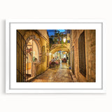 Abstract art print of Montenegro scenery in muted blue and green tones, framed with a white mat.