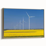 Framed canvas featuring a vintage-style landscape painting of a European scenery in black and gold tones.